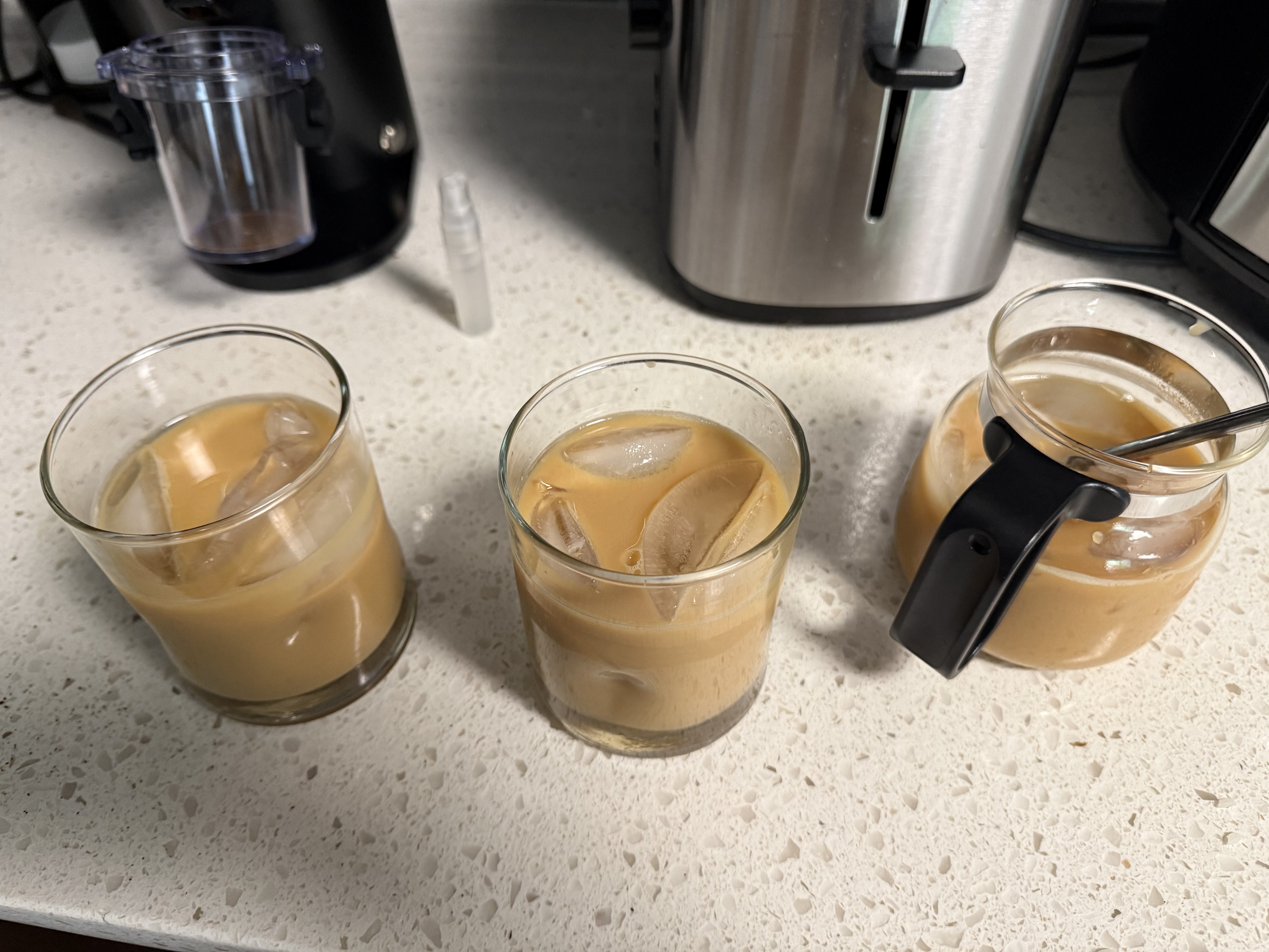 All three cups with milk and ice