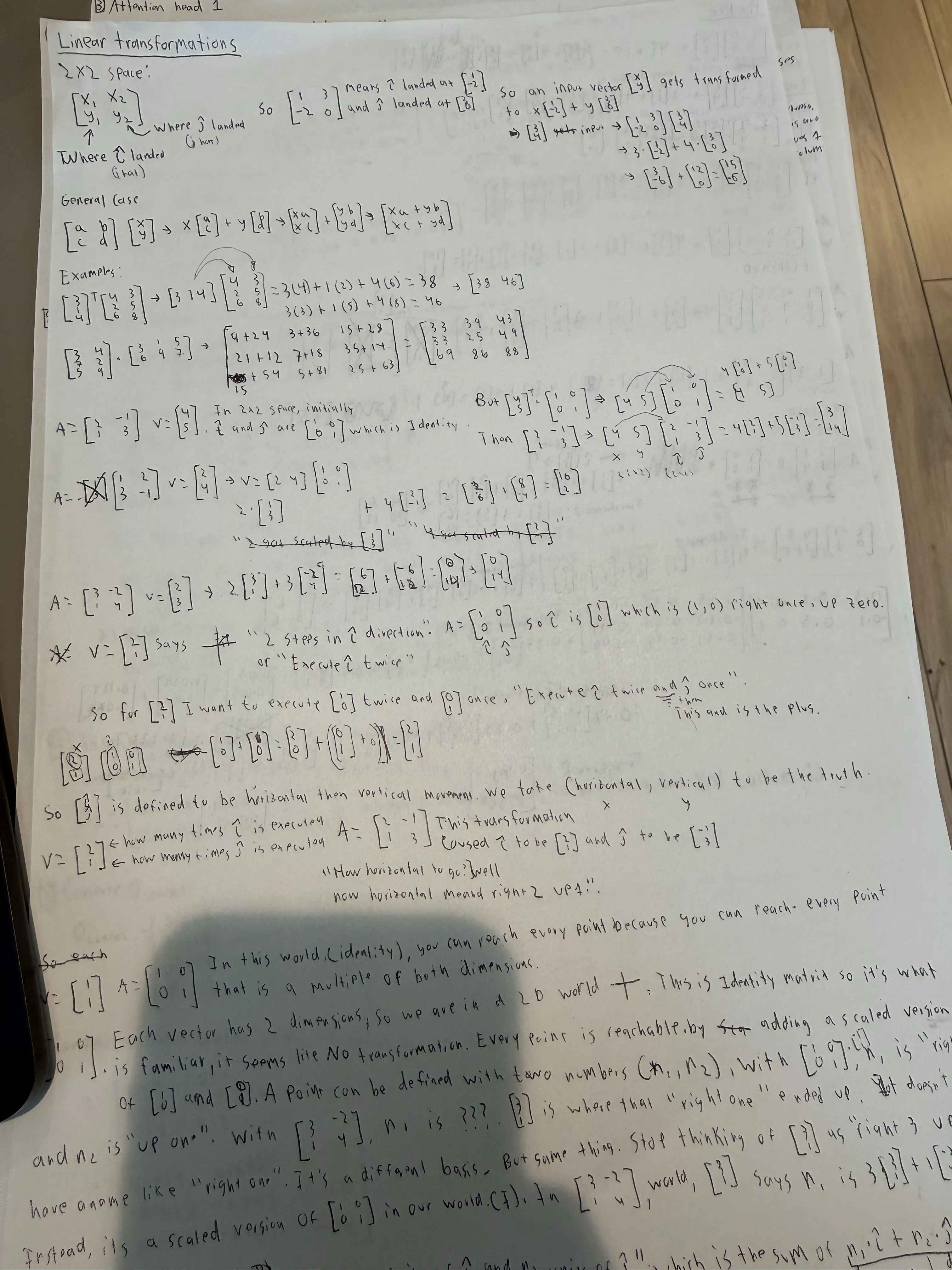 Handwritten notes explaining linear transformations and basis vectors